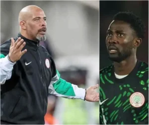 Nigeria's football coach passionately gestures on the sidelines, while his goalkeeper looks concerned in the latest international match.