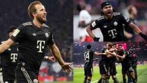 Harry Kane célèbre un but marqué pour le Bayern Munich en tenue noire, tandis que ses coéquipiers célèbrent joyeusement en arrière-plan face au RB Leipzig.