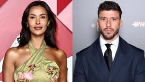 Maya Jama in een elegante groene jurk en Ruben Dias in een donker pak, beiden poseren zelfverzekerd tegen contrasterende achtergronden.
