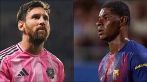 Messi in a pink Inter Miami kit and Rashford in a blue Barcelona shirt face each other, both displaying focused expressions during a match.