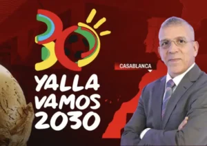 Casablanca-themed graphic featuring a smiling man in a suit beside the text "Yalla Vamos 2030" and a decorative football, highlighting Morocco's 2030 vision.