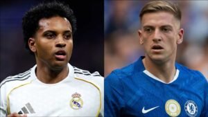 Rodrygo in a white Real Madrid kit alongside Chelsea striker in blue, highlighting potential transfer targets for Liverpool and Man Utd.