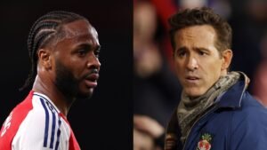 Raheem Sterling, vêtu d'un maillot d'Arsenal, l'air pensif, aux côtés du copropriétaire de Wrexham Ryan Reynolds, qui paraît réfléchi dans une veste et une écharpe.