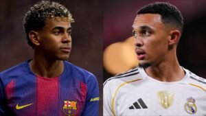 Barcelona's Yamal in a blue and claret kit alongside Real Madrid's Alexander-Arnold in an all-white kit, set against a blurred stadium backdrop.