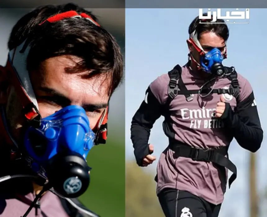 Moroccan football player training with a performance-enhancing mask during a workout session, emphasising athletic preparation.